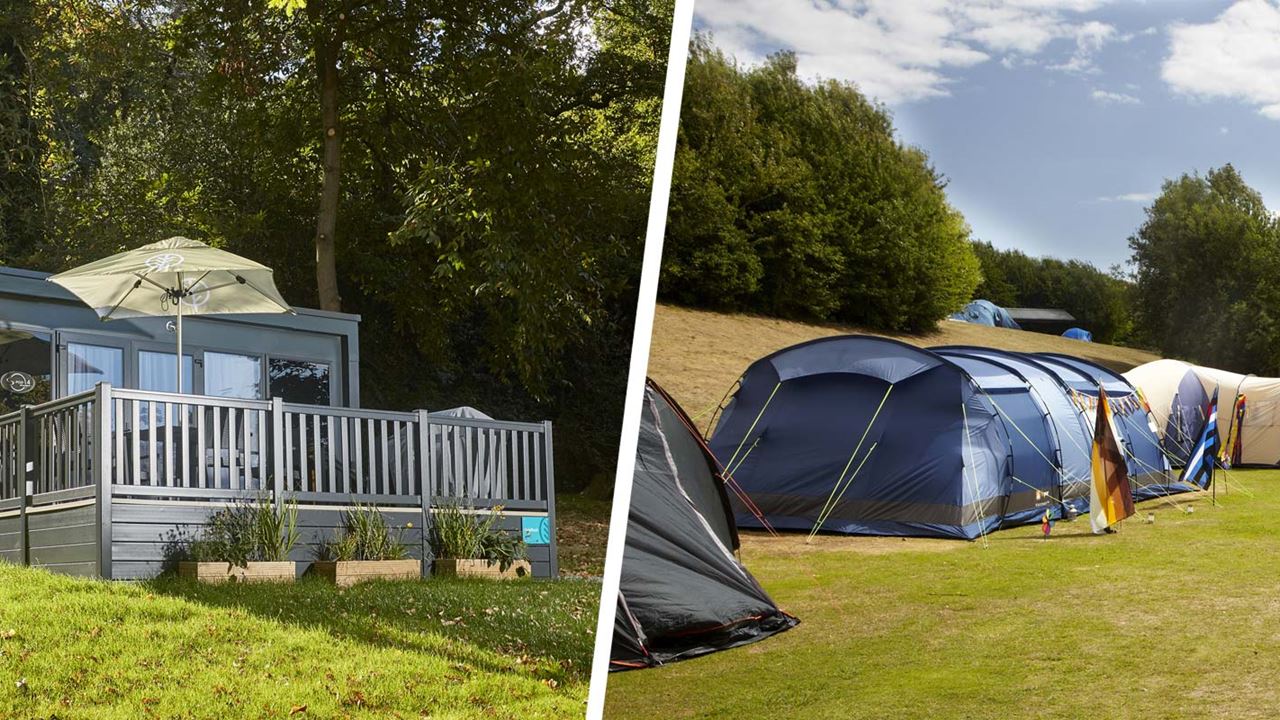 Luxury glamping pod on grassy knoll and lines of tents of various sizes