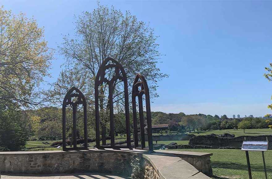 A view over the ruins and towards the city at Lesnes Abbey Woods viewing point near Abbey Wood Campsite, London