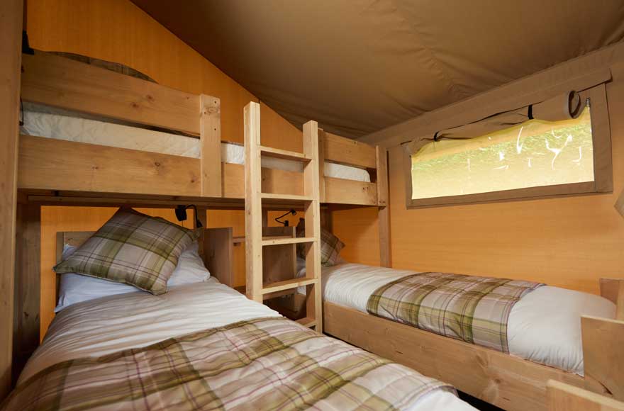 Three bunk beds, ideal for accommodating multiple guests.