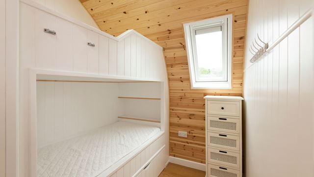 bedroom with bunk bed and dresser