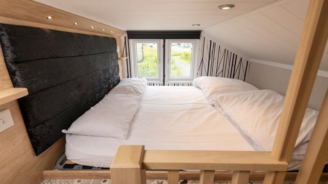 Cozy bedroom on mezzanine floor